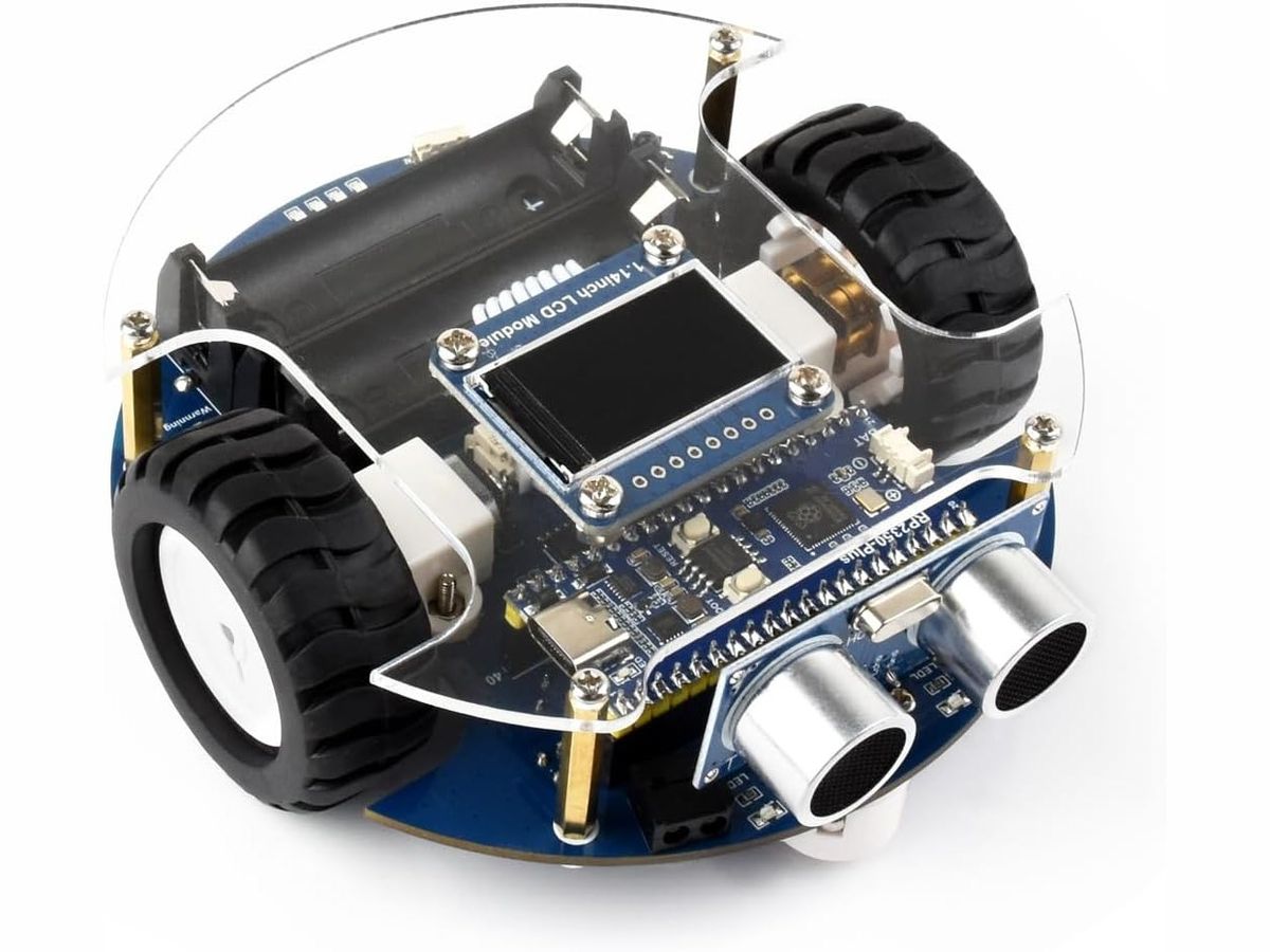 Runder Lernroboter Pico2Go mit blauer Platine, zwei schwarzen Rädern, Ultraschallsensor vorn, kleinem Farbdisplay und transparenter Acrylabdeckung.