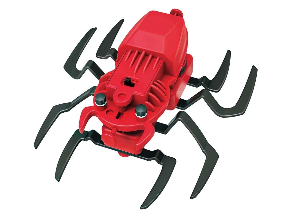 Montierter Spider Robot: roter Spinnenkörper mit acht schwarzen Beinen, Schalter und zwei Augenknöpfen.