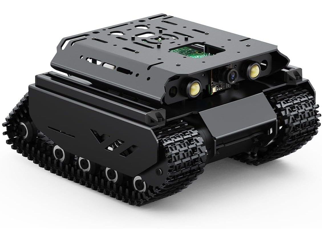 Schwarzes Kettenfahrzeug UGV Beast mit Montageplatte, zwei Frontscheinwerfern und Kamera zwischen den Lampen.
