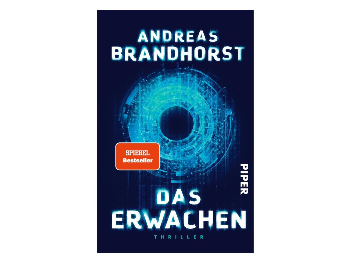 Buchcover „Das Erwachen“ von Andreas Brandhorst: dunkelblauer Grund mit leuchtend hellblauen, kreisförmig angeordneten digitalen Mustern und Datenströmen, roter Aufkleber „Spiegel Bestseller“, darunter „Thriller“, seitlich Verlagslogo Piper