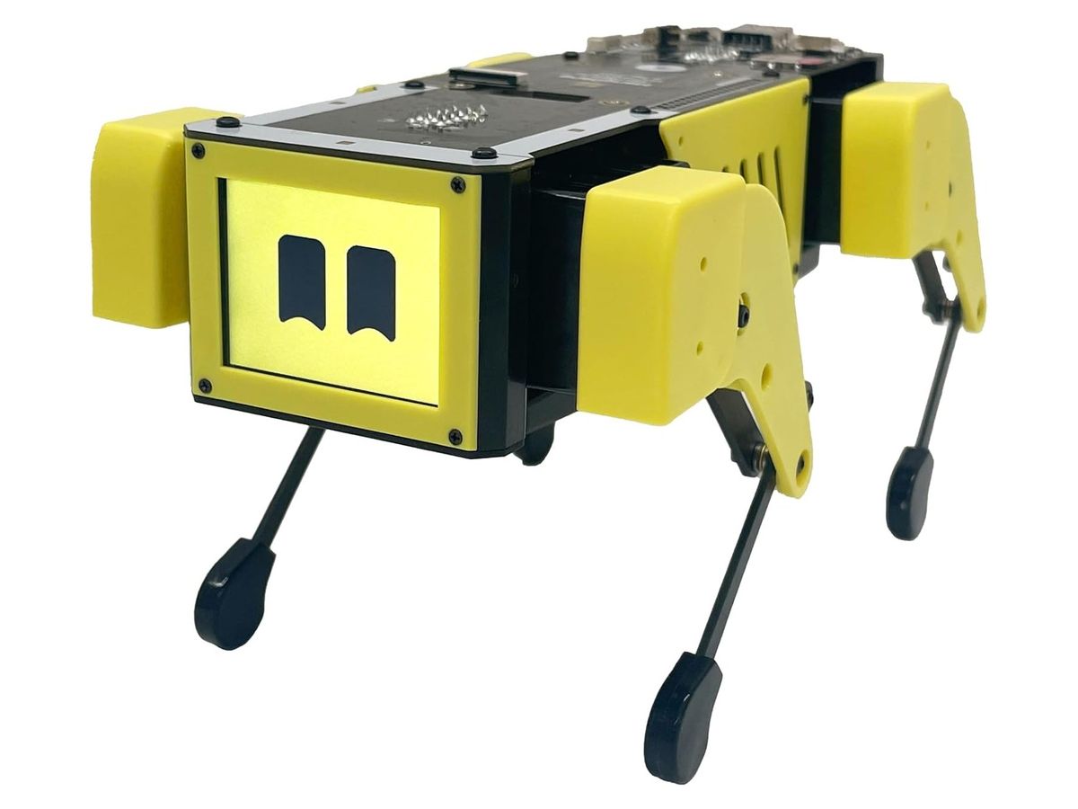 Kleiner gelb-schwarzer Roboterhund Mini Pupper 2 mit Display-Gesicht aus zwei Augen, offener Platine auf dem Rücken und dünnen schwarzen Beinen.