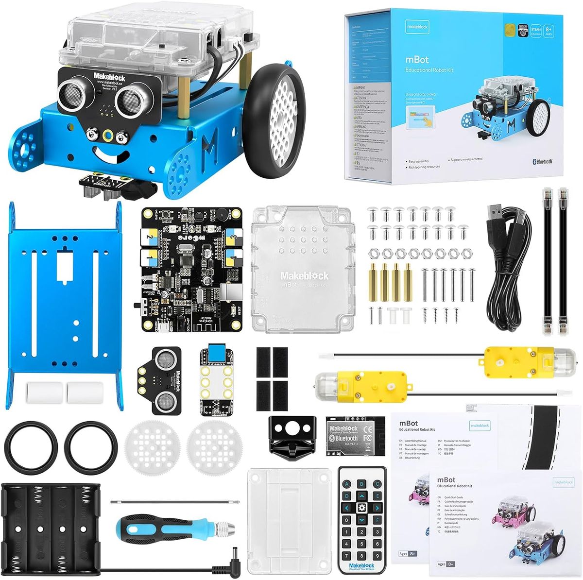 Der fertig gebaute blaue mBot mit Verpackung und dem kompletten Lieferumfang: Chassis, Platine, Motoren, Räder, Sensoren, Fernbedienung, Batteriefach, Schraubendreher und Anleitungen