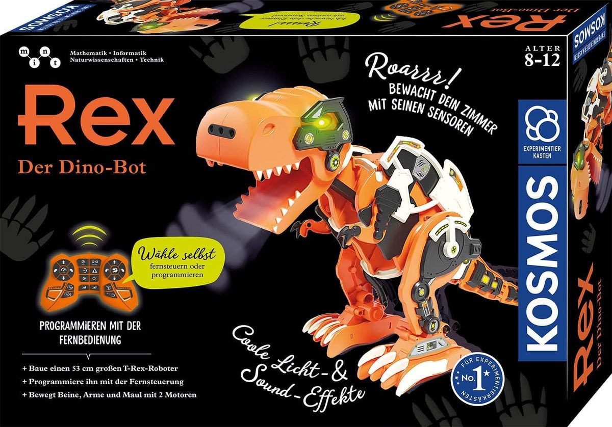 Verpackung des KOSMOS Rex mit orangefarbenem T-Rex-Roboter und Fernbedienung auf schwarzem Grund.