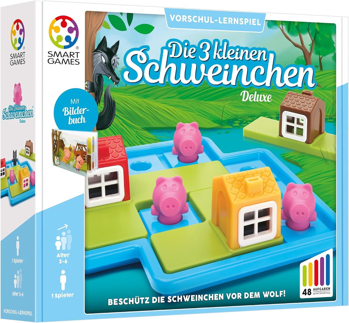 Verpackung von Die 3 kleinen Schweinchen Deluxe mit blauem Spielfeld, drei rosa Schweinen, drei Häusern und dem Wolf im Hintergrund